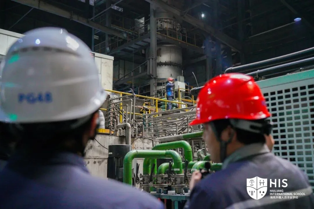 Students observing the intelligent production line