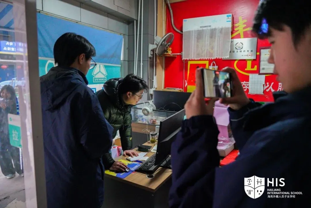 Students recording community interview notes